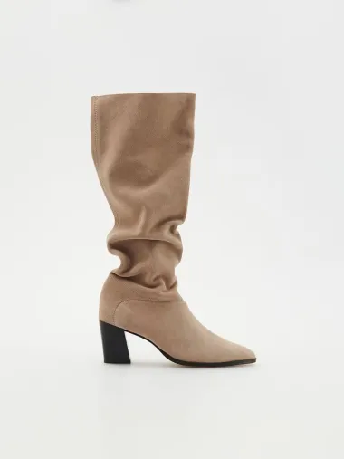 Na modnu scenu se vraćaju elegantne visoke čizme, a ovo su naši high street favoriti