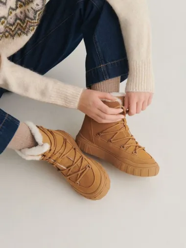 Buce i tople čizmice - modeli koji pristaju uz svaki look