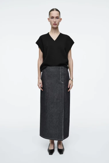 Traper suknje u zimskim kombinacijama: Bezvremenski komad koji podiže svaki outfit