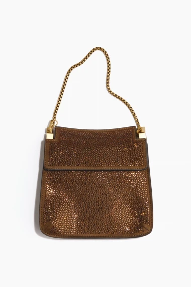 H&amp;M party komadi: Sjaj, saten i cozy klasici za blagdansku sezonu