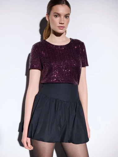 Svečani prosinac u znaku šljokica: Komadi koji će podići svaki outfit