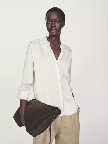 Komad koji nikad ne izlazi iz mode: Bijele ko&scaron;ulje u proljetnim kombinacijama