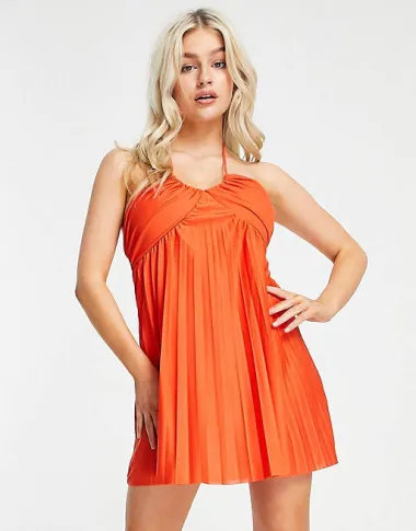 Narančaste haljine savršeno će naglasiti preplanuli ten